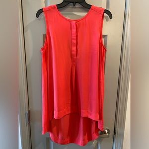 Oversized orangish red top for business casual or a casual night out!